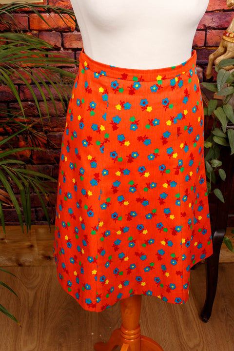 70er Disco Minirock orange Blumen